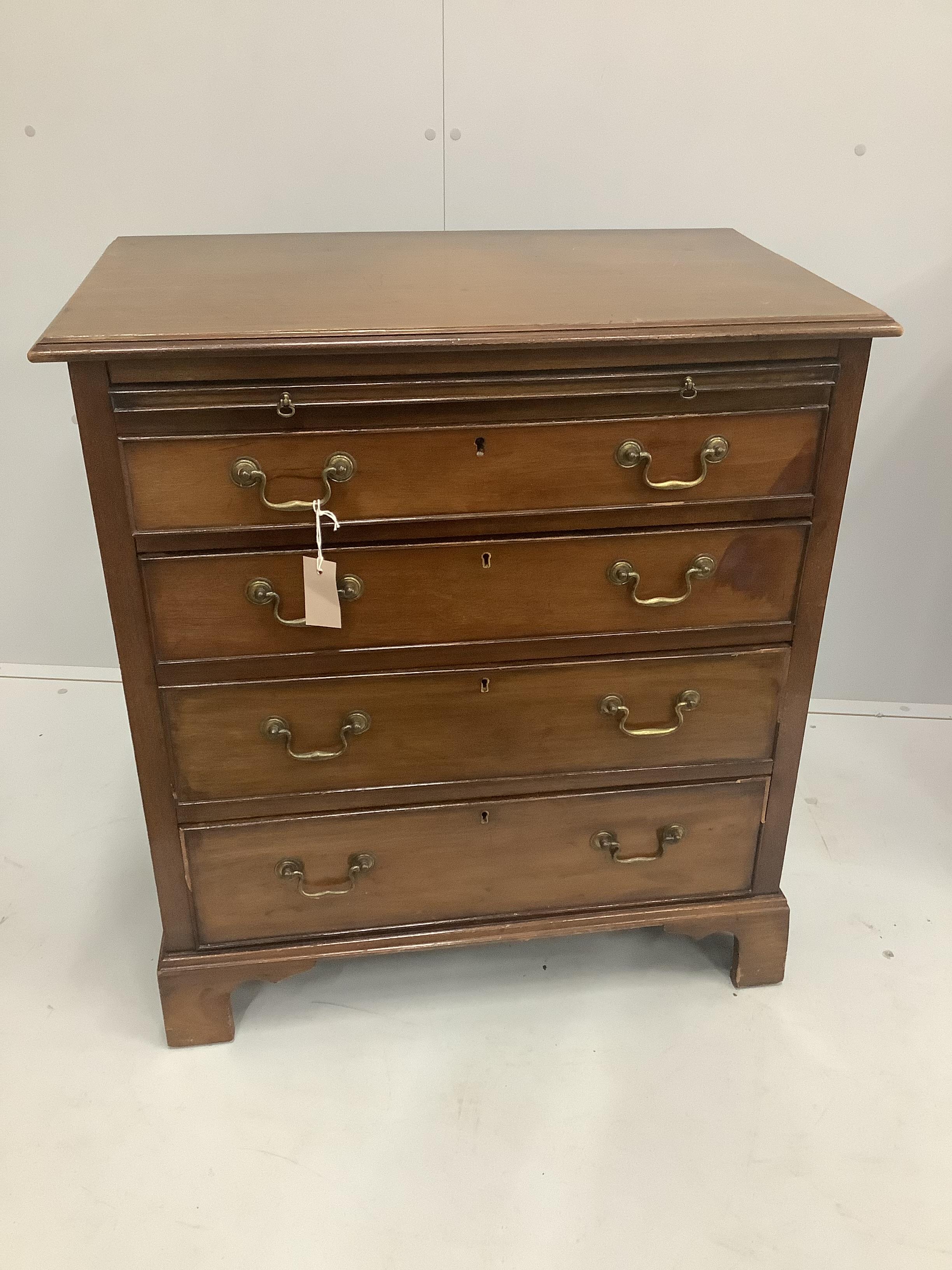 A small George III style mahogany chest with slide, width 76cm, depth 45cm, height 82cm.